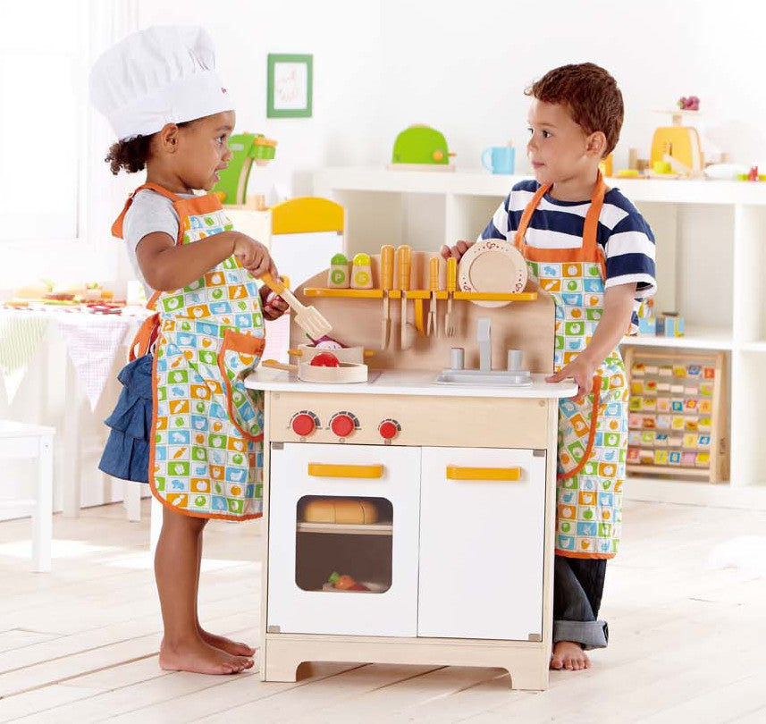 Gourmet Kitchen + Starter Set. Note: Food toys not included